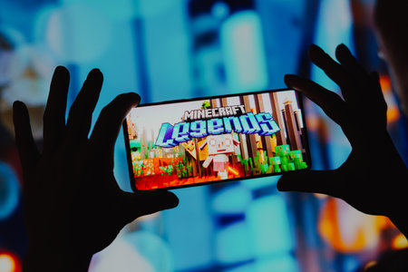 December 4, 2023, Brazil. In this photo illustration, the Minecraft Legends logo is displayed on a smartphone screenのeditorial素材