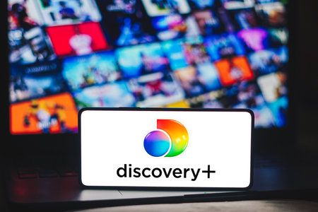 December 5, 2023, Brazil. In this photo illustration, the Discovery Plus logo is displayed on a smartphone screenのeditorial素材