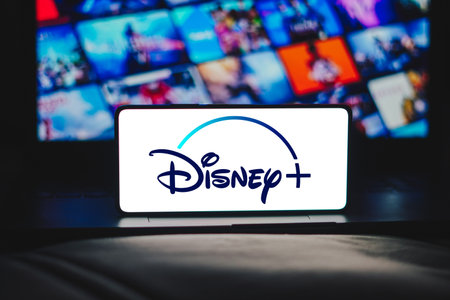 December 5, 2023, Brazil. In this photo illustration, the Disney Plus logo is displayed on a smartphone screenのeditorial素材