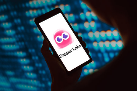 February 23, 2024, Brazil. In this photo illustration, the Dapper Labs logo is displayed on a smartphone screenのeditorial素材