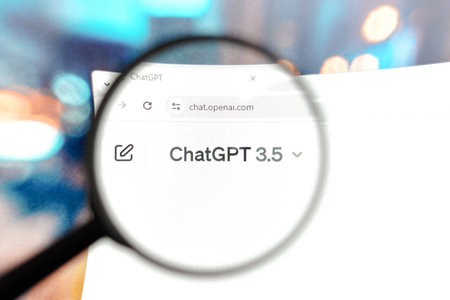 April 8, 2024, Brazil. In this photo illustration, the homepage of the ChatGPT website seen on a computer screen through a magnifying glassのeditorial素材