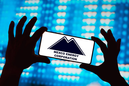 April 16, 2024, Brazil. In this photo illustration, the Mexco Energy Corporation logo is displayed on a smartphone screenのeditorial素材