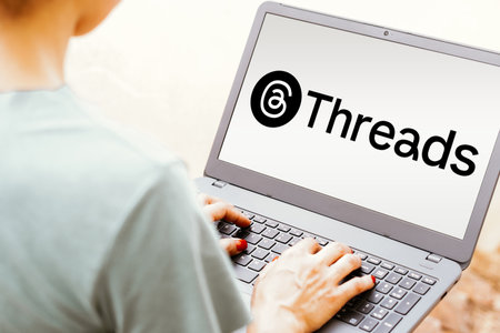 May 6, 2024, Brazil. In this photo illustration, the Threads logo is seen displayed on a laptop screenのeditorial素材
