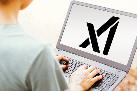 May 25, 2024, Brazil. In this photo illustration, the xAI logo is seen displayed on a laptop screenのeditorial素材