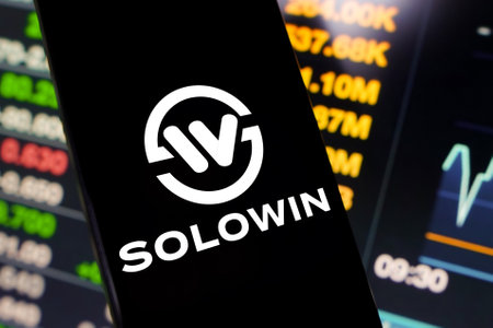 May 25, 2024, Brazil. In this photo illustration, the Solowin Holdings logo is displayed on a smartphone screenのeditorial素材