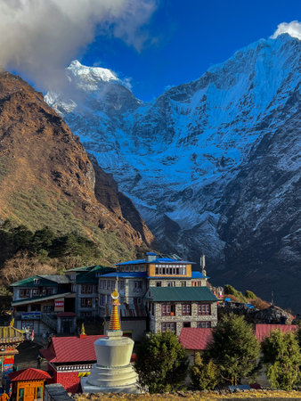 Colorful houses with snowy mountain in the backgroundの写真素材