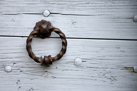 knocker on wooden doorの写真素材