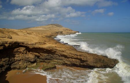 The coastal desert of la guajira near the rock formation of the pan de azucarの写真素材