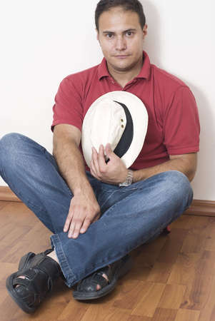 Portrait of a young adult man isolated on whiteの写真素材