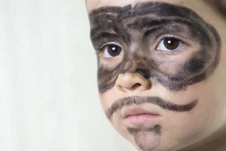 young happy boy in "The Zorro" make-upの写真素材