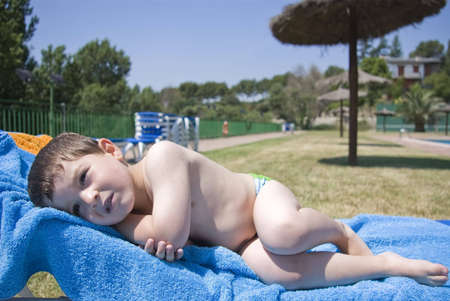 A sweet kid laying on the hammockの写真素材