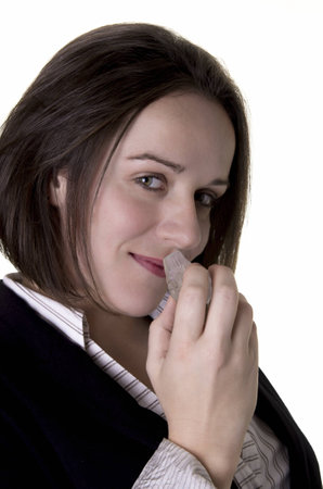 Young beautiful woman with a bottle of perfumeの写真素材