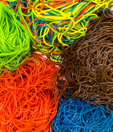 Colorful candies as background, top view