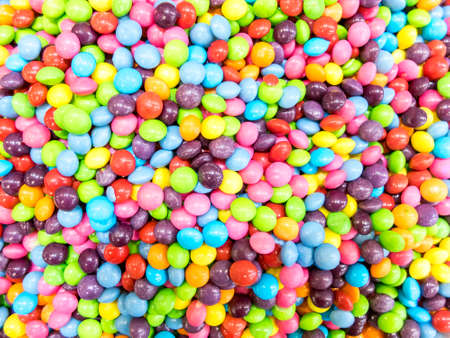 Colorful candies as background, top viewの写真素材