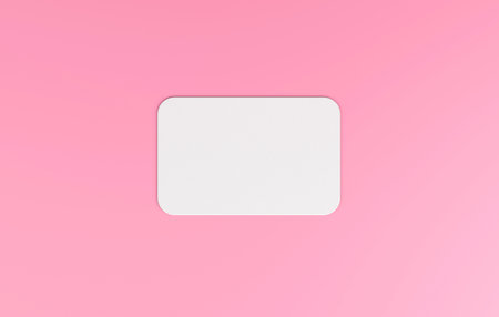 Blank white card isolated on pink pastel color background minimal conceptual 3D illustrationの写真素材