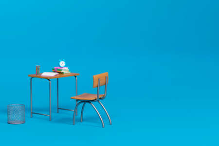 School desk with school accessory on the table on blue background. 3D illustrationの写真素材