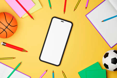 Top view of a set of school supplies and mobile phone on yellow background. 3d illustrationの写真素材