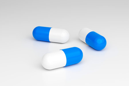 Blue capsule pills on white background. 3d illustration
