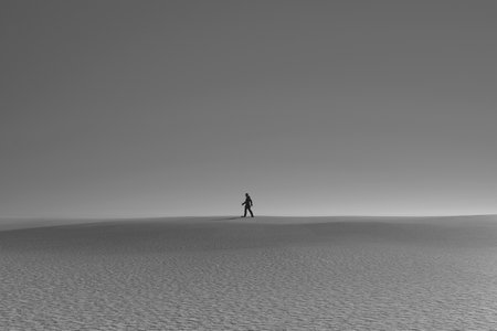 Silhouette of a person walking in the desert. 3d illustrationの写真素材