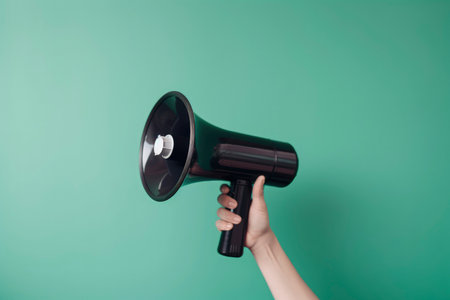 Illustration of hand holding megaphone, marketing and sales concept, green background. Generative AIの素材