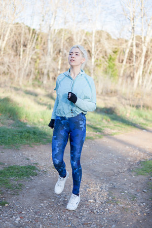 fitness sport woman blonde girl running runner nature lifestyle