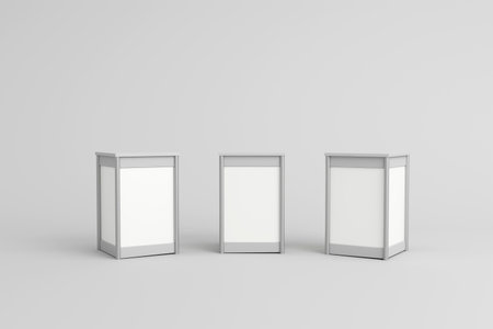 Three blank display counters arranged side by side, perfect for branding and showcasing products at trade shows, exhibitions, or promotional events.の写真素材