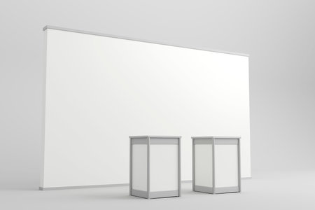 Two blank display counters set in front of a large white backdrop, suitable for customizable presentations, branding, and product displays at events or trade shows.の写真素材