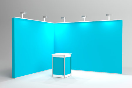 An empty exhibition booth with vibrant blue walls, a small counter, and overhead spotlights. Minimalist setup suitable for trade shows and presentations.の写真素材