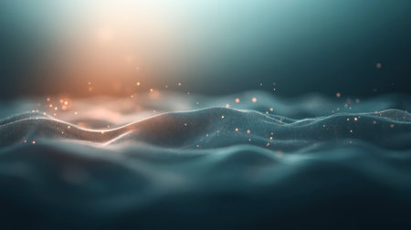 Digital wave landscape with small glowing particles floating above a soft, undulating mesh. Abstract background with warm light and depthの素材