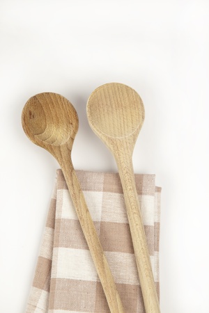 Wooden spoon on a napkinの写真素材