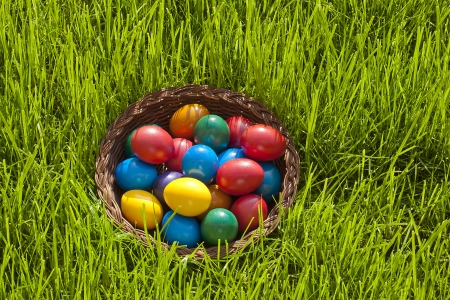 Plain colorful Easter Eggs in a bastketの写真素材