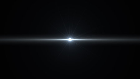 star with lens flare and bokeh effect on dark background.の写真素材