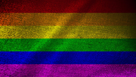 Abstract Pride gay flag grunge waving in the wind. Rainbow flag painted on a piece of cloth or...