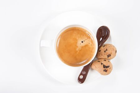 cup of coffee with biscuit on a white background の写真素材
