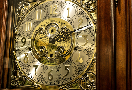 An old antique mechanical grandfather clock
