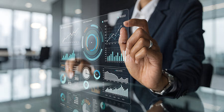 Executive finger interacting with virtual holographic display showing glowing charts maps and...