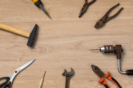 Various tools related to homework on wooden background