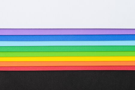 Thin sheets of multicolored cellular rubber arranged into iridescent shapeの写真素材