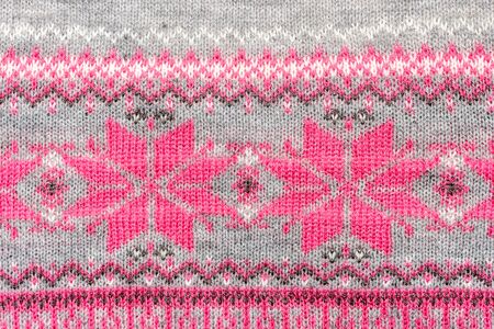 Crochet woolen fabric pattern usable as wallpaperの写真素材