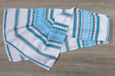Traditional ethnic slavian towel on wooden table