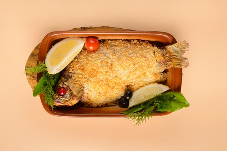 Fried crucian carp with lemonの写真素材
