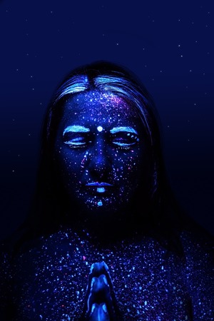 Pregnant girl in neon lightの写真素材