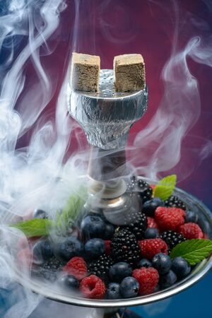 Closeup of hookah with tray full of berriesの写真素材
