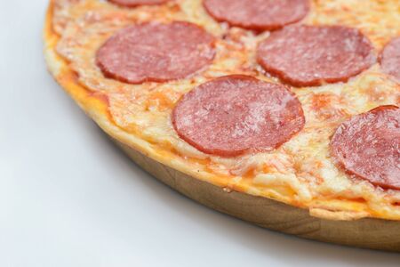 Pizza pepperoni on whiteの写真素材