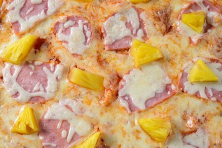 Hawaiian Pizza isolated on blackの写真素材