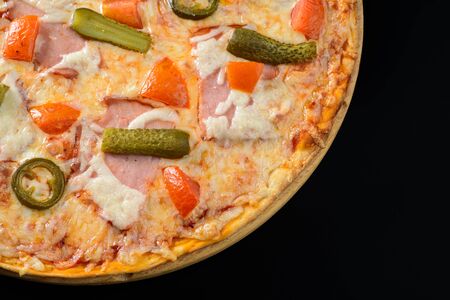 Pizza isolated on blackの写真素材