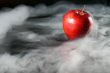 Apple in fragrant smokeの写真素材