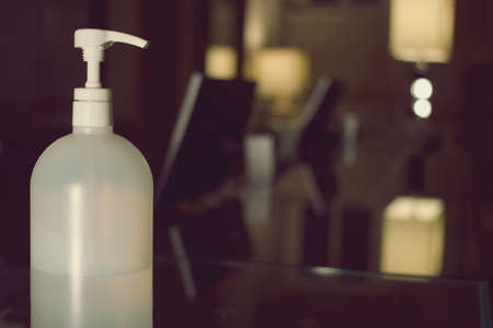 Hand sanitizer bottle placed in Hotel Reception during Corona Virus spring 2020