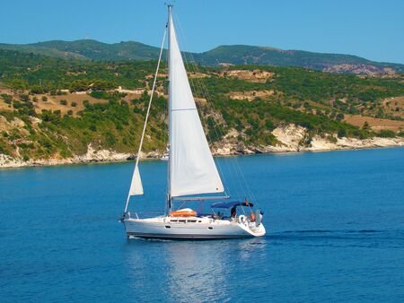 A sailing boat in the ionian sea      の写真素材