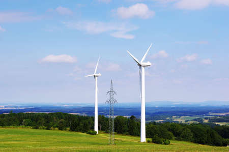 Two wind turbines and pylone - Alternative energy.